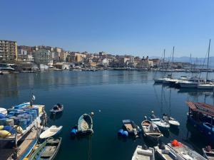 a group of boats are docked in a harbor at L'Atrio Suite in Torre del Greco