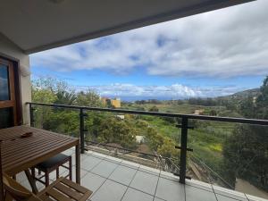 a balcony with a table and a view at Casa Maricarmen villa in Tacoronte