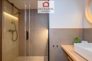 a bathroom with a shower and a sink at Horitzó Marí Palamós in Palamós +18 photos