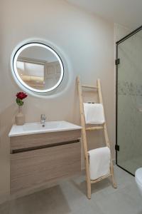 a bathroom with a ladder and a sink and a mirror at GUELIZ Seven Stays in Marrakesh +61 photos