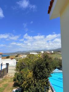 a view of a swimming pool from a house at Queen Evridiki in Peyia +24 photos