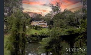 a rendering of a mansion with a pond and trees at Maleny Lakeside Retreat l 5BDRM l Firepit l Pets Ok in Maleny +54 photos