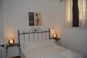 Llit o llits en una habitació de Apartamentos Manbea Algaida