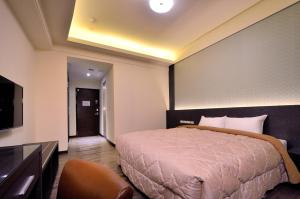 Μια τηλεόραση ή/και κέντρο ψυχαγωγίας στο Yundu Business Hotel