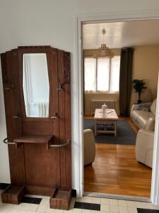 a door leading into a living room with a living room at Cosynumber8 in Bar-sur-Seine