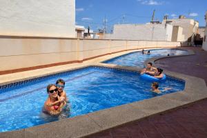 a group of people in a swimming pool at Calpe Cycling in Calpe