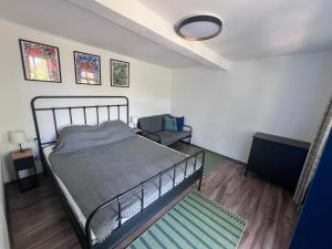 a bedroom with a bed in a room at Casa Albastra in Mahmudia