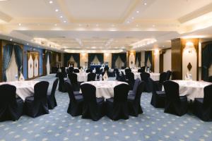 a banquet hall with tables and chairs in it at Concorde El Salam Sharm El Sheikh Front Hotel in Sharm El Sheikh +93 photos