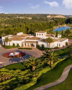 an aerial view of a house with a golf course at Mar y Golf in Orihuela Costa