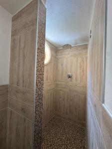 a bathroom with a shower with a tiled floor at b&b centro città in Agrigento