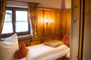 Postel nebo postele na pokoji v ubytování Chalet am Frohmarkt + 4 fotografie