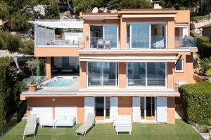 an aerial view of a house with a swimming pool at Villa Eze Vue Mer in Éze