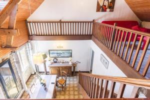 an overhead view of a living room with a staircase at Gîte G1255 in Tribehou