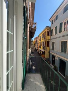 a view of a street from a balcony of a building at Chiara in Cairo Montenotte