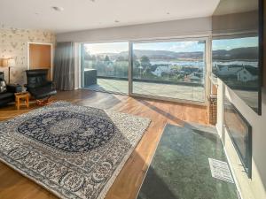 a living room with a view of a living room at Grey Rocks House in Kippford