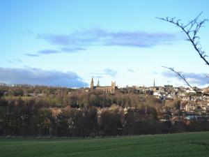 a city on top of a hill with a castle at Inzievar in Oakley +7 photos