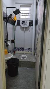a small bathroom with a sink and a toilet at MatiinJannah Homestay Arau in Arau