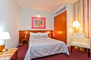 Postel nebo postele na pokoji v ubytování Triton Hotel Piraeus + 37 fotografií