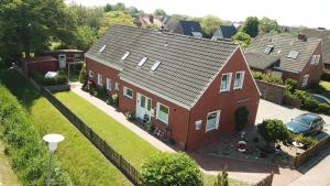 an overhead view of a red brick house at Haus Morgenstern Fewo Boben in Neuharlingersiel