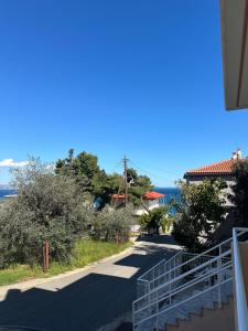 a view from the balcony of a house at Luxury Beach House 2 in Xiropigado