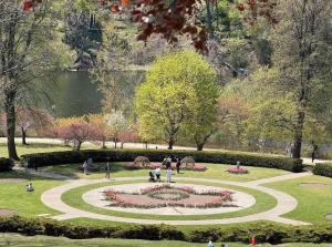 a park with a circular garden with people in it at TORONTO UNIVERSITY PRIVATE ROOM-Next to Eaton Centre in Toronto