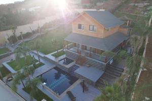 an overhead view of a house with a swimming pool at Villa aya in Oujda