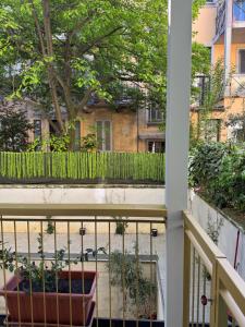 a balcony with a view of a street at Villa Dorée in Milan