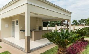a house with a pavilion on top of it at Apartamento próximo Aeroporto Cuiabá in Várzea Grande