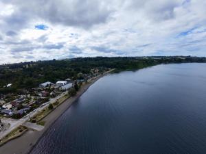 an aerial view of a large body of water at Amadeus Hotel Boutique in Frutillar