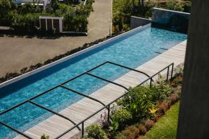 an overhead view of a swimming pool in a backyard at Panoramic View Mauritius in Ruisseau Créole