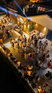 a group of people standing around in a room at Skopea Inn Exclusive Hotel in Göcek +68 photos