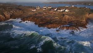 an aerial view of a rocky island in the ocean at Viking House Hotel Donegal in Kincasslagh +28 photos