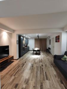 a living room with a couch and a table at CIVICO 1 in Valguarnera Caropepe +13 photos