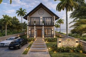 a house with a car parked in front of it at Coco Villa Payagala in Paiyagala South