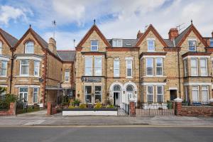 a large brick building on a city street at The Tennyson in Bridlington