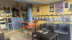 a room with chairs and a table in a store at 7 Calcosas in Valverde