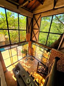 an overhead view of a room with large windows at Cabañas el Nopal in San Gil