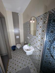 a bathroom with a sink and a toilet at Ośrodek Wrzos in Boruja +31 photos
