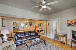 a living room with a couch and a ceiling fan at Walkable Group Getaway in Bisbee: 4-Unit Bundle! in Bisbee