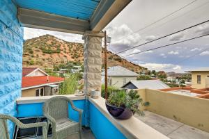 a balcony with two chairs and a view of a mountain at Walkable Group Getaway in Bisbee: 4-Unit Bundle! in Bisbee