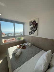 a bedroom with a bed with a tray of food on it at Casa de Nicole in Protaras +201 photos