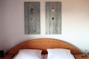 Postel nebo postele na pokoji v ubytování Pension zum Lusenblick