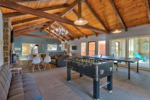 a living room with a ping pong table at Cavalier Condos #32 in Lincoln City