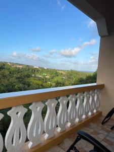 a balcony with a view of the mountains at Serene Escape in Bellevue