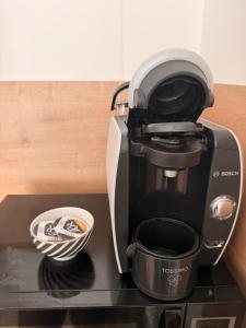 a coffee maker sitting on top of a counter at Bright and cozy studio entre Paris et Disneyland in Champs-sur-Marne