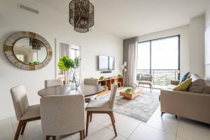 a living room with a table and a couch at Luxury Condo - 3B3B with Amazing Skyline View in Miami