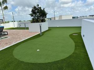 a miniature golf course on the roof of a building at Luxury Condo - 3B3B with Amazing Skyline View in Miami