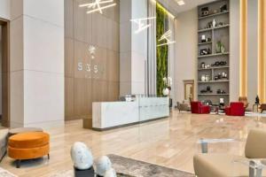 a lobby with a reception desk in a building at Luxury Condo - 3B3B with Amazing Skyline View in Miami