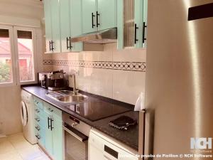 a kitchen with a sink and a counter top at Carbonería 4 in Soria