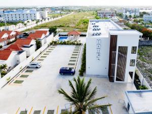 an aerial view of a building with a parking lot at Stars Hotel Bavaro in Punta Cana